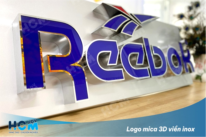 Gia công logo mica 3D kết hợp viền inox giá tốt