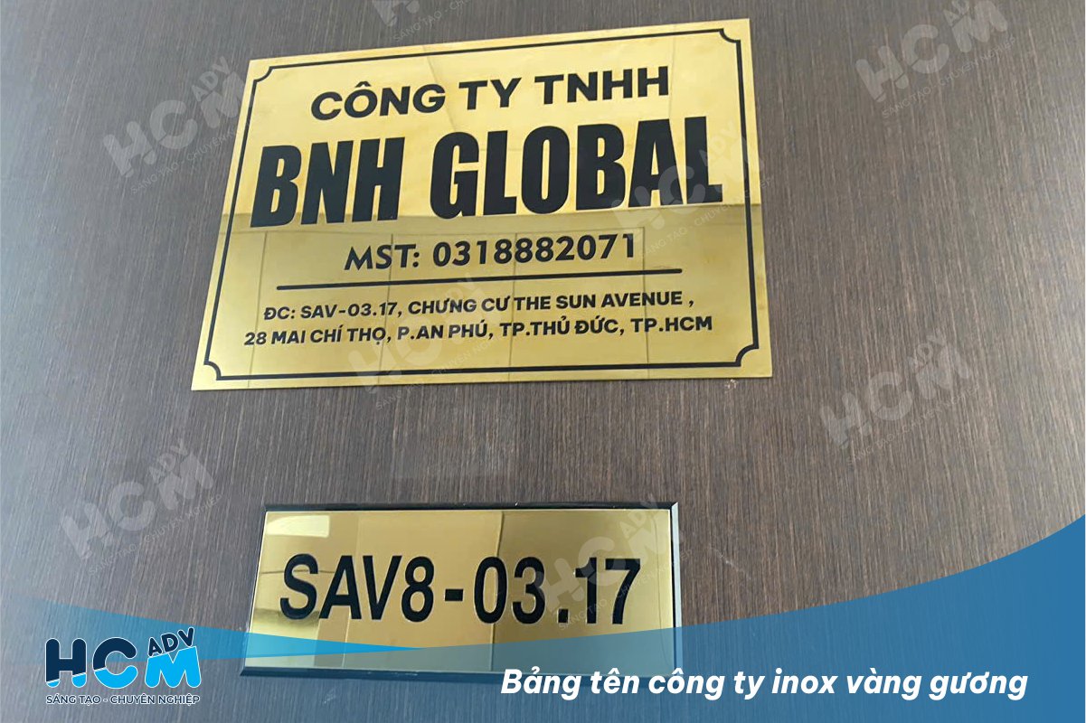 Mẫu bảng tên công ty inox vàng gương sáng bóng treo tại văn phòng Quận 2, TP.HCM